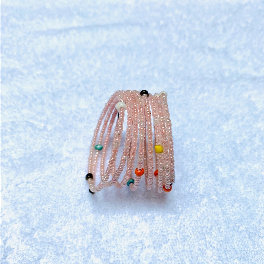 Girl’s pink bracelet.